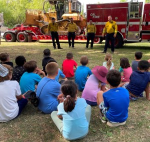 Capt. Matt, Capt. Mitch, firefighters Miquel and Brian from the Cal Fire Gordon Valley Station with Camp Adobe campers!